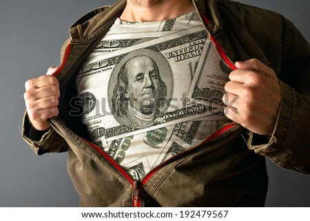 Man wearing dollar shirt. man showing his US dollar shirt under jacket.