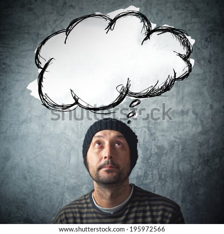 Casual man with thinking balloon cloud with copy space for your text or graphics