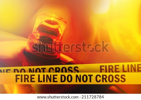 Fire Line Do Not Cross Yellow Headband Tape and Orange flashing and revolving light.