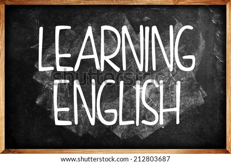 Learning English title on Language School Blackboard. Education concept.