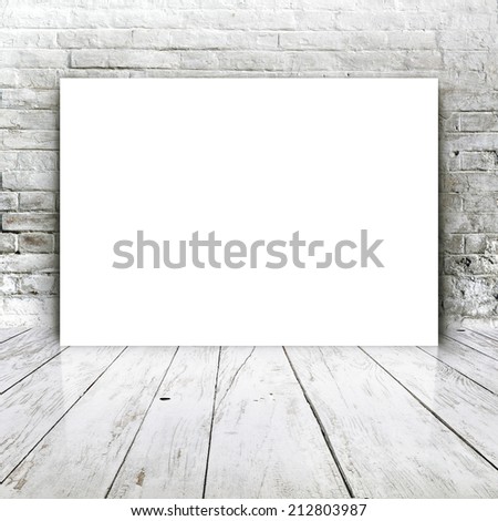 Blank poster as copy space template for your artwork or design in Vintage empty Room interior with white brick brick wall and wooden floor.