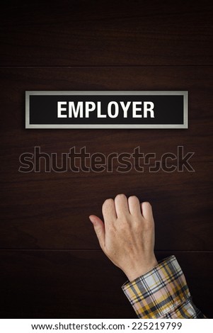 Female hand is knocking on Employer door, conceptual image
