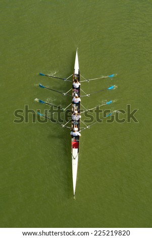 NOVI SAD, SERBIA - OCTOBER 18, 2014: Four women rowing on Danube River in Novi Sad on traditional remote regatta competition.