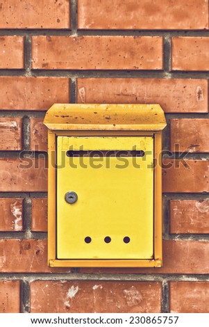 Old obsolete Post Mail Box on brick wall