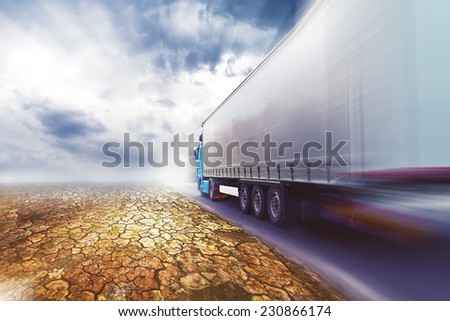 Speeding Transportation Truck driving on highway road through the desert.