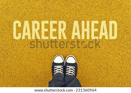 Top View of Young Unemployed Man standing on street pavement in front of Career Ahead sign printed.