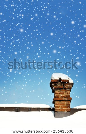Old brick Chimney on the roof covered with snow as copy space
