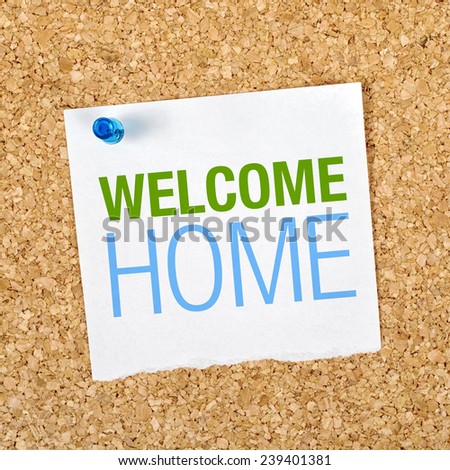 Welcome Home Message on Reminder Paper pinned to a Cork Memory Board