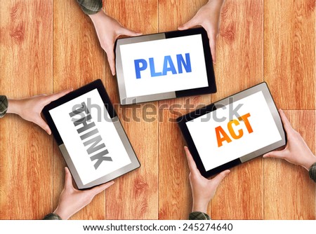 Think Plan Act Business Concept with Coworkers Hands holding Digital Tablet Computers.