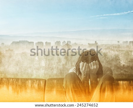 Double exposure Social Alienation Concept, Depressed Man covering face and crying in despair.
