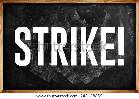 teachers on Strike Concept, Word Strike on School Chalkboard.