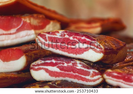 Cured Bacon Stack, Smoked and Preserved Pork Meat is Considered a Delicacy Food in Some Cultures, selective focus.