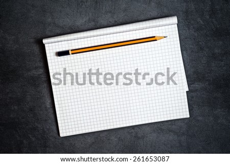Pencil And Blank Notepad Page as Copy Space for Text Message