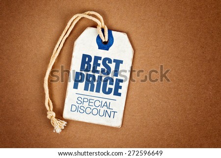 Best Price Special Discount Vintage Tag Label on Brown Grunge Textured Background, Top View