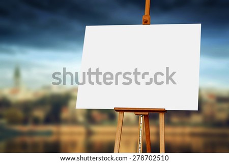 Wooden Easel with Blank Painting Canvas as Copy Space for Mock Up Painting