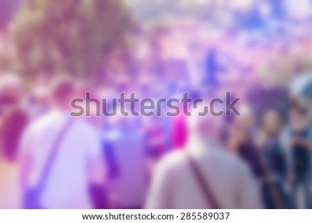 Blurred Crowd of People On Street, General Public Concept with Unrecognizable Crowded Population out of Focus, Vintage Toned Image.
