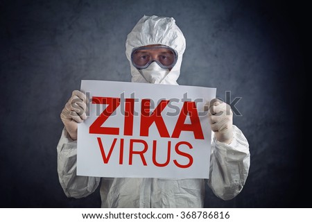 Zika virus concept, medical worker in protective clothes showing alertness poster