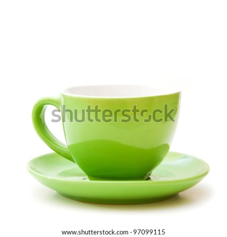 Empty green ceramic coffee cup