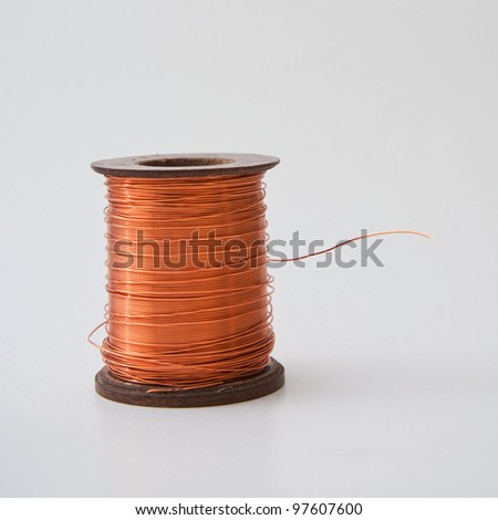 Copper wire rolled up on a spool
