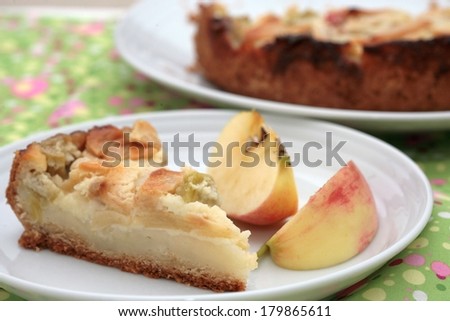 A piece of pie with apples and rhubarb