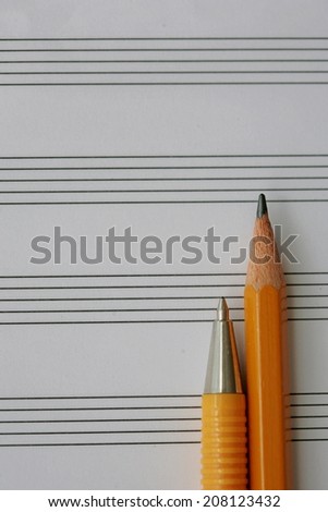 Music score paper, pen and pencil
