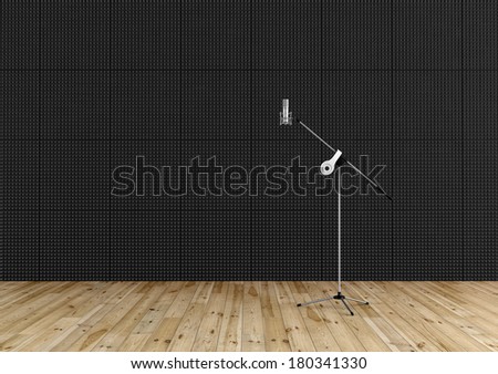Professional microphone in a recording studio with black acoustic panel and wooden floor - rendering