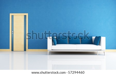 blue interior with modern couch and wooden door