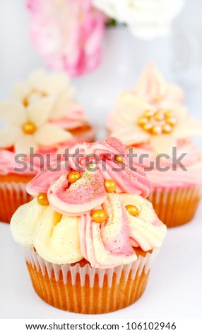Cupcakes with buttercream and marzipan decoration