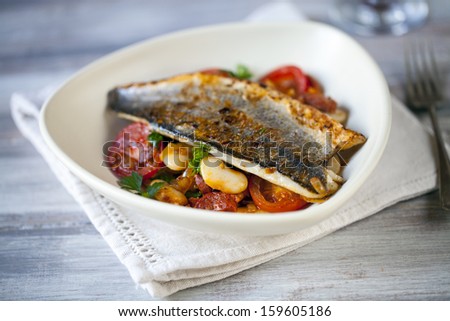 Sea bass fillet with butter bean and chorizo salad
