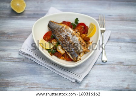Sea bass with butter bean and chorizo salad