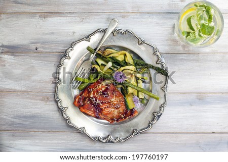 Salmon with courgette and asparagus salad