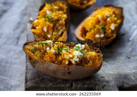Baked sweet potato with feta cheese and chives