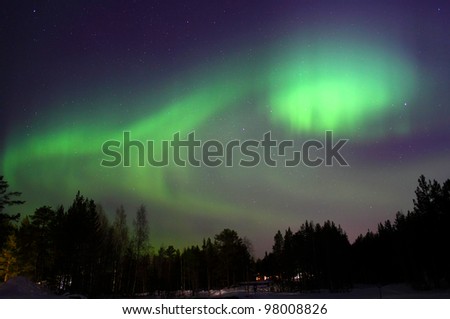 Northern lights, aurora borealis in finish Lapland