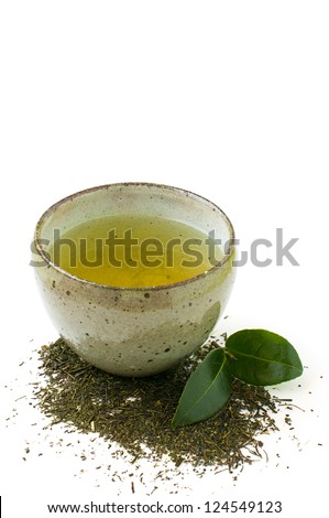 green tea in a bowl isolated on a white background green tea in a bowl isolated on a white background