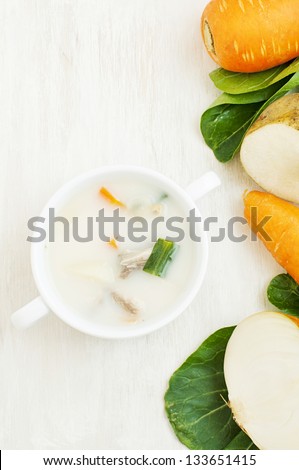 milk soup with vegetables and fish