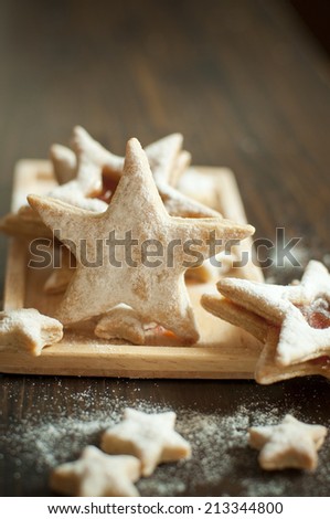 star cookies with jam on a plate