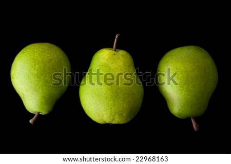 Three pears on a black background