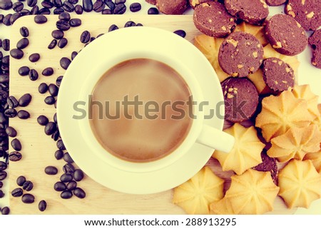 Vintage style - Coffee cup and Chocolate cookies and Butter cookies