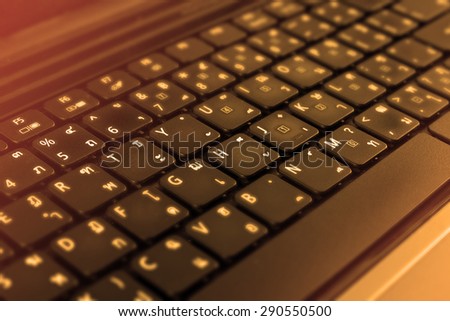 Vintage style - Close up of Laptop Computer keyboard. Selective focus, shallow depth of field.