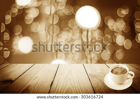Vintage style - Abstract Black and White bokeh of light and coffee cup and wood background