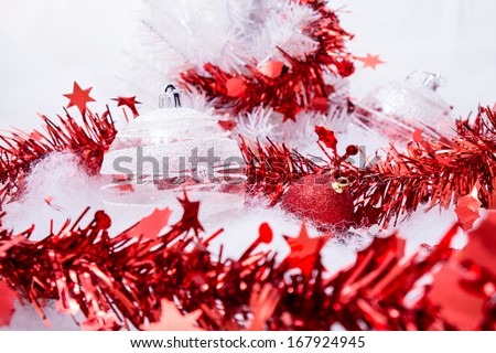 Transparent ball  and red theme decoration on snow