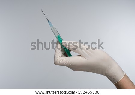 syringe hand in glove