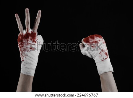 shook his bloody hand in a bandage, bloody bandage, fight club, street fight, violence, bloody theme, black background, isolated, bloody fists, boxer, tied his hands with a bandage