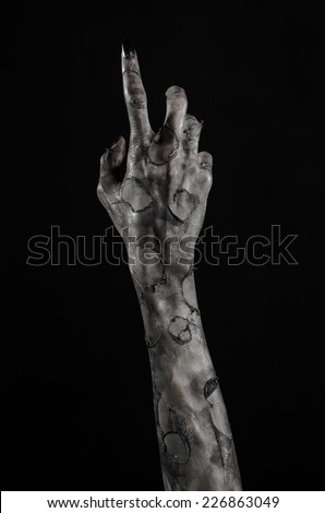 terrible zombie hands, dirty hands of the mummy, zombie theme, halloween theme, black background, isolated, black hand of death with black fingernails, monstrous art
