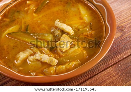 Russian soup rassolnik .Meat soup with pickled.farmhouse kitchen