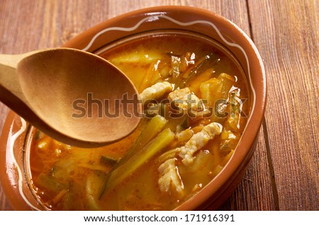 Russian soup rassolnik .Meat soup with pickled.farmhouse kitchen