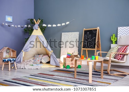 Modern room interior with play tent for child