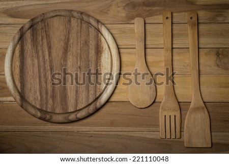 kitchenware on wood background