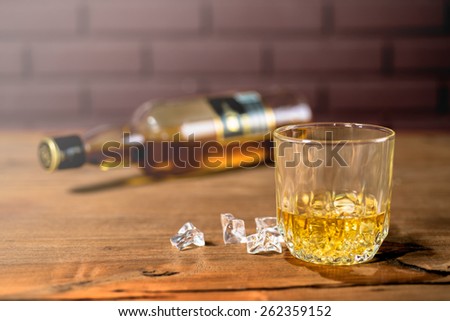 Whiskey drinks on wood in bar