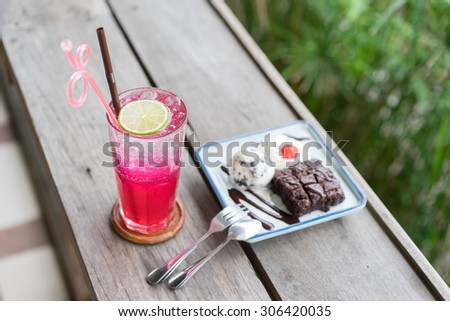 brownie with ice cream and Red soda